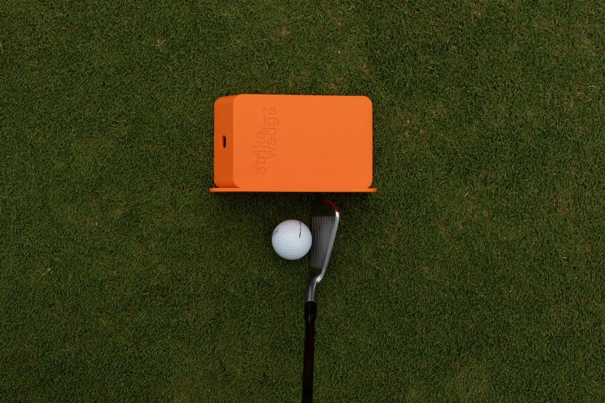 Strike Wedge set up for heel and shank strikes: the wall attachment/ruler just outside the toe of the club.