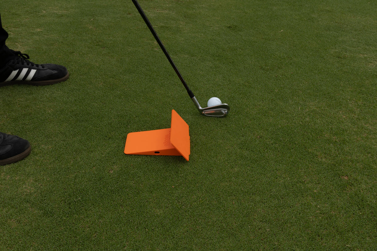Strike Wedge set up for a hook: the wall attachment/ruler on the back, behind the ball on the inside.