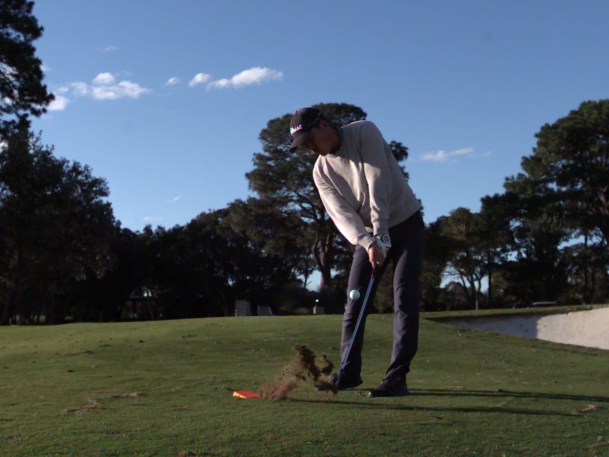 Placeholder poster for the 30-second intro: a golfer at impact with Strike Wedge behind the ball.